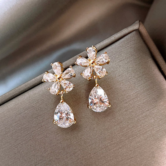 Boucles d'oreilles marguerite & zircons